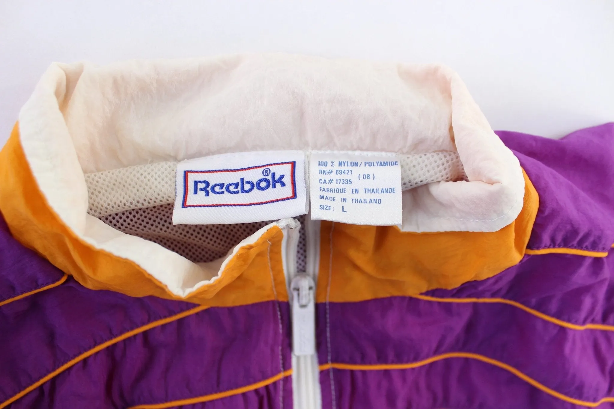 Women's Vintage Reebok Embroidered Logo White, Orange,  & Purple Zip Up Jacket